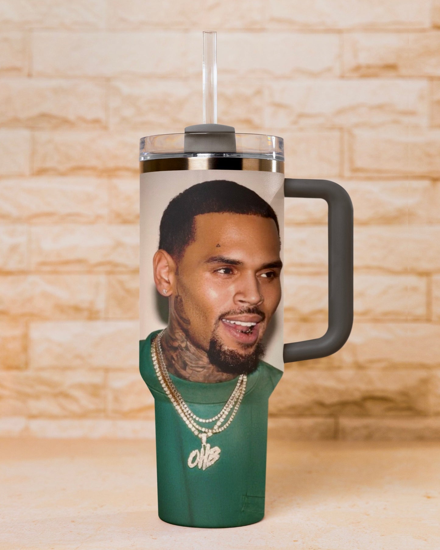 Grey 30oz Chris Brown insulated tumbler with straw topper

